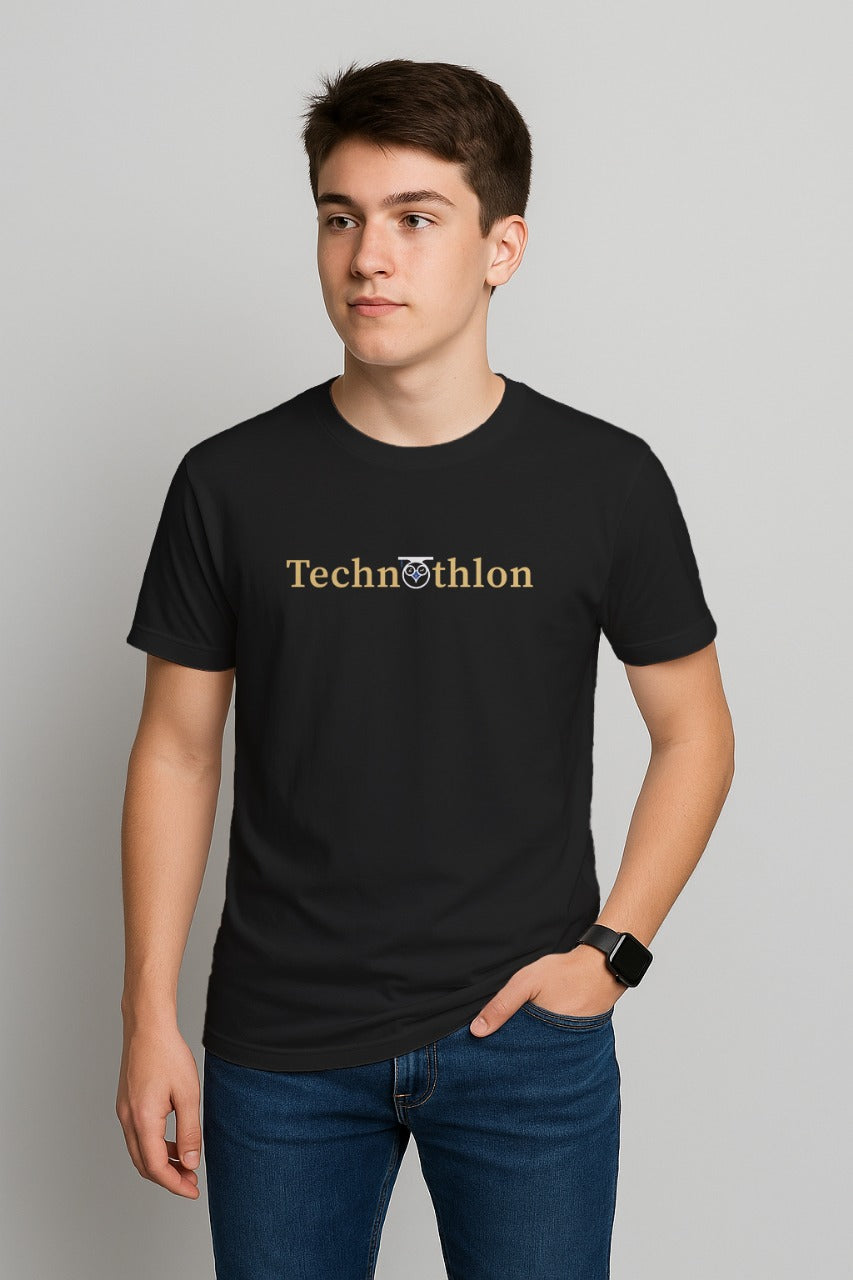 Person wearing a white t-shirt with 'Technothon' logo on a plain background. technothlon iit guwahati 