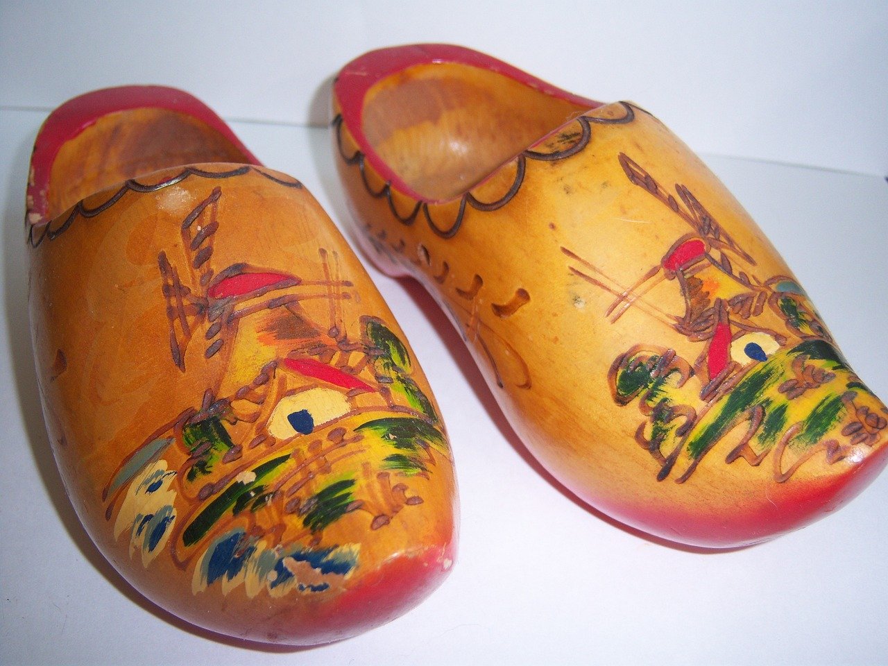 -up of a woman's feet wearing different sizes of sandals, with Indian and UK shoe size labels on each